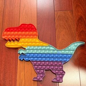 Kids Dinosaur Rainbow Pop Fidget Toy - Multicolor